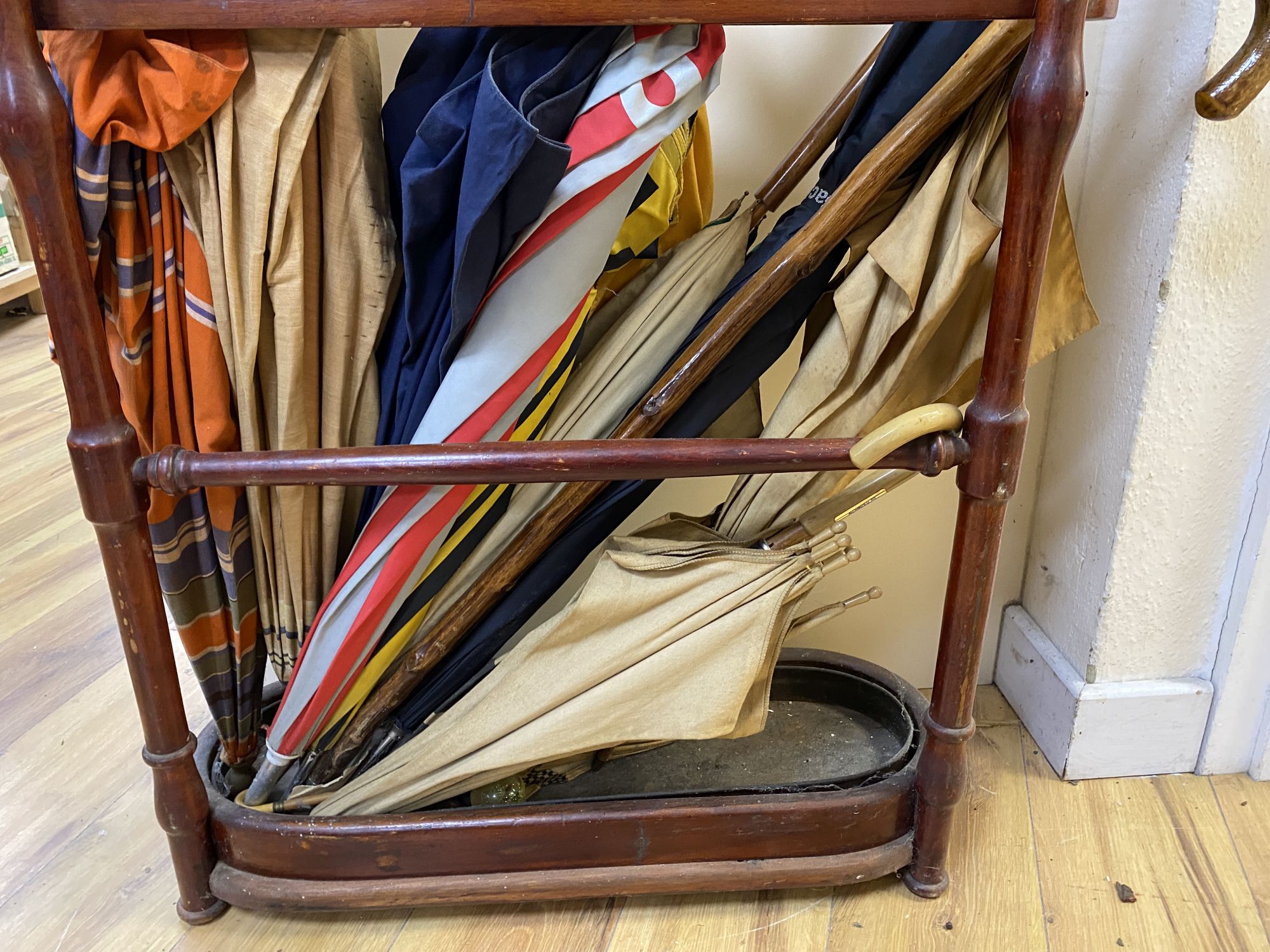 A bentwood stick stand and sticks